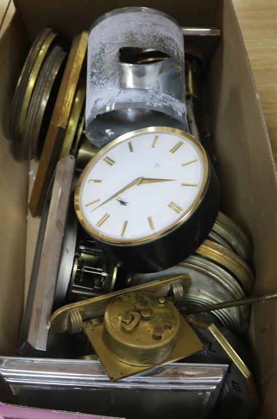 A box of clock mechanisms / parts